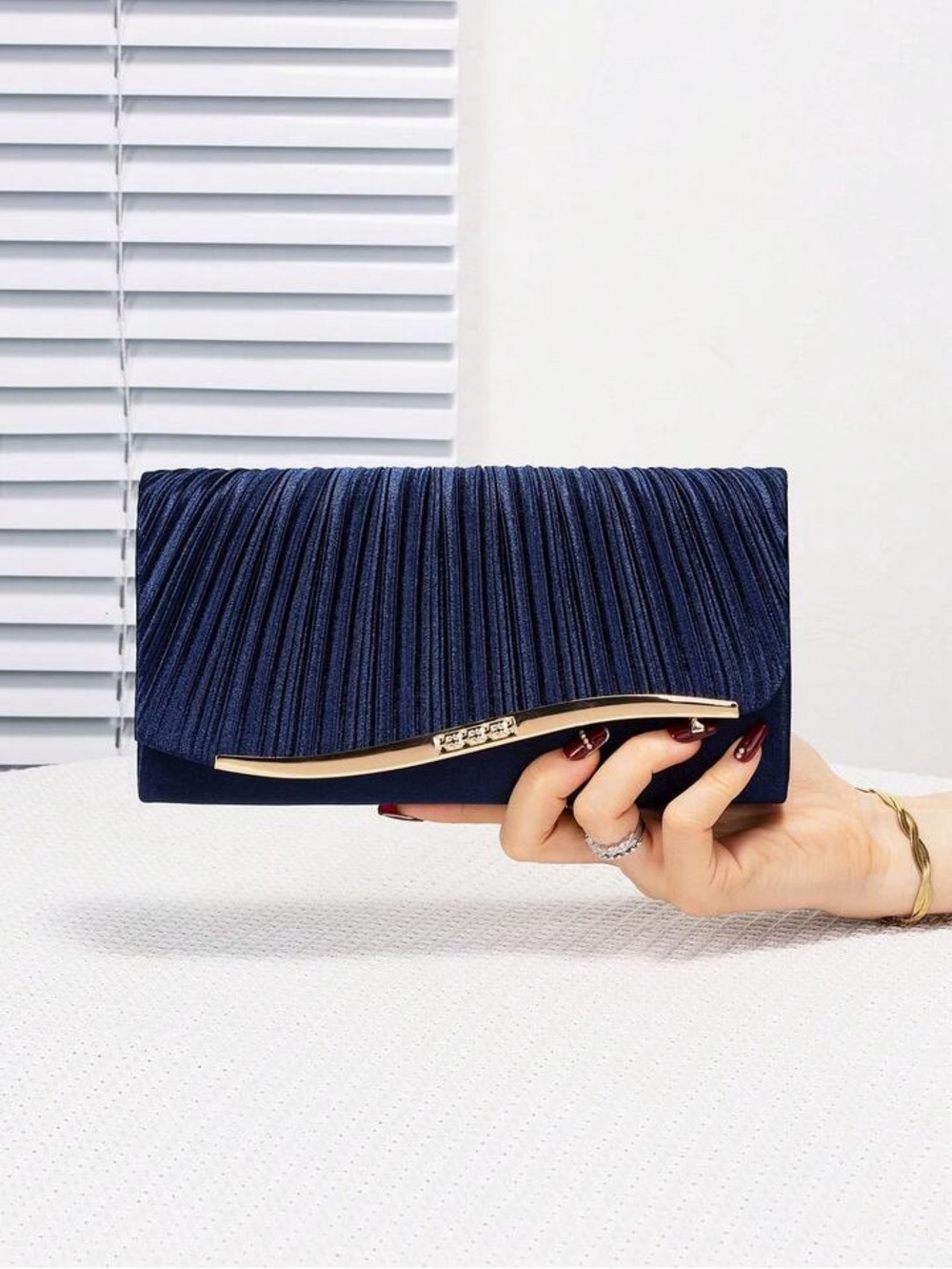 Elegant Navy Pleated Evening Clutch with Gold Accent